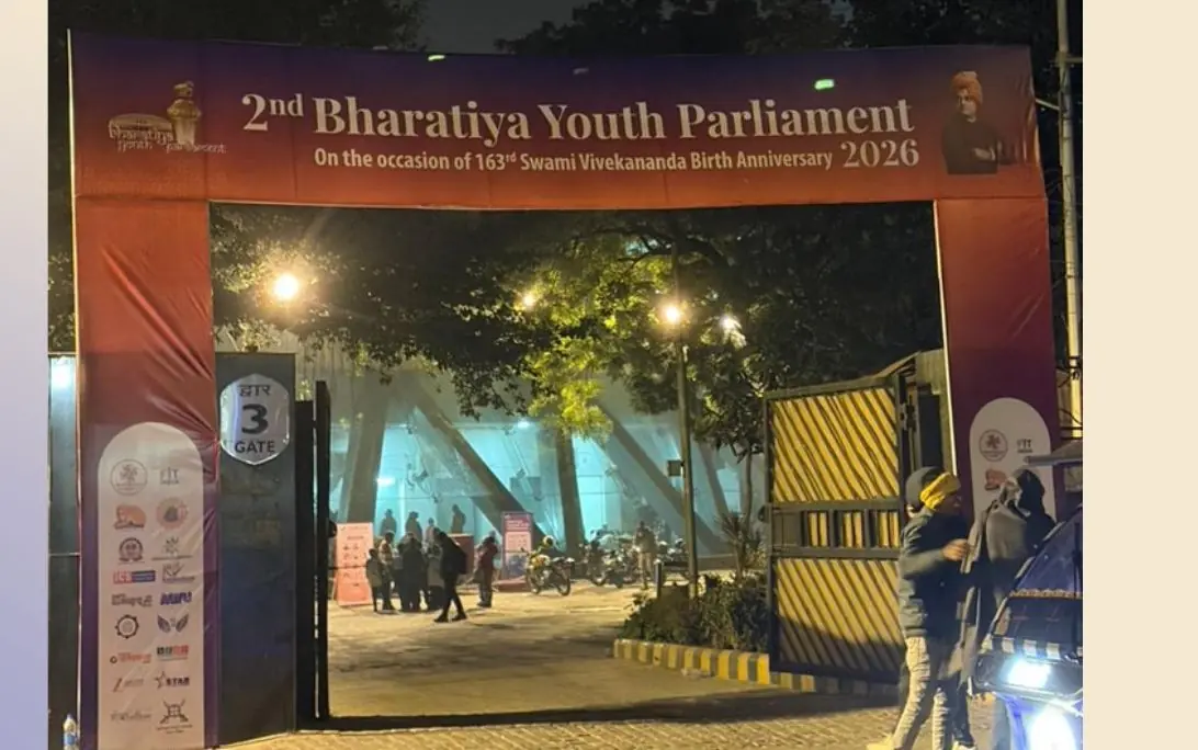 The entrance arch built and lit at night